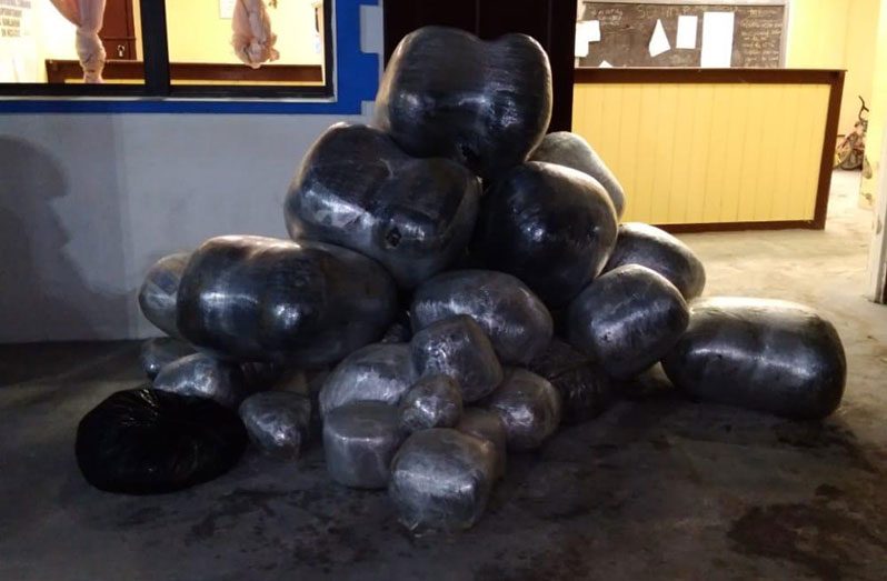 The bulky plastic bags which contained a quantity of seeds, leaves and stems, suspected to be cannabis
