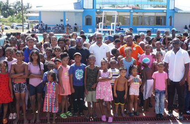 Officials and participants of the August Vacation swim programme take a photo-op (Emmerson Campbell photo)