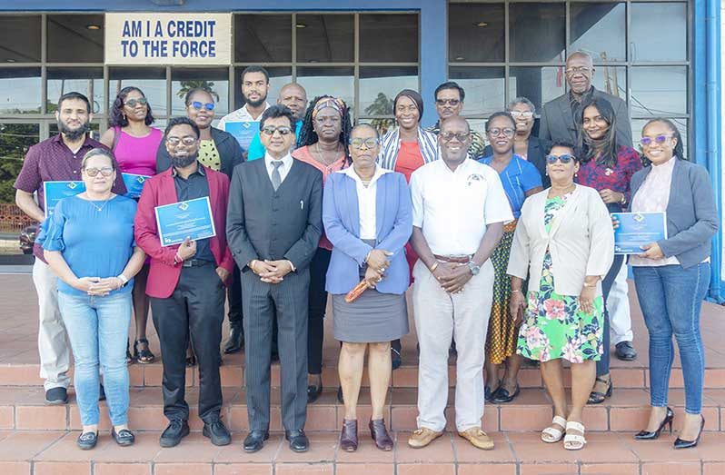 Attorney General Anil-Nandlall, SC; International Mediator and Mediation Coach Dr. Dianne Williams; Restorative Justice Director Orrin Boston, and officials engage with training participants