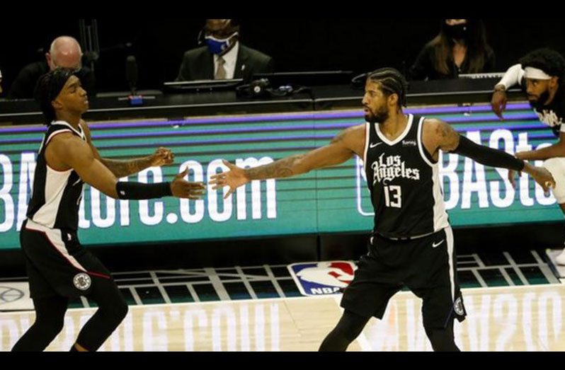 Terance Mann (left) and Paul George played a key role as LA Clippers beat Utah Jazz in game six.