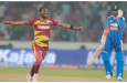 Keemo Paul celebrates one of his five wickets against India in the fourth T20I