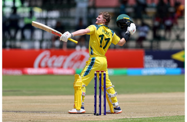 Oliver Peake celebrates his century  • ( ICC/Getty Images)
