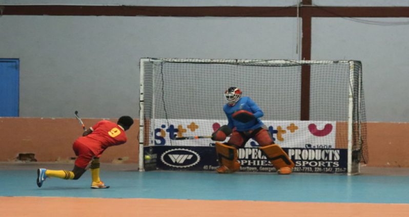Jaguars’ captain Andrew Stewart watches as his penalty flick being saved by Pumas’ custodian Medroy Scotland.