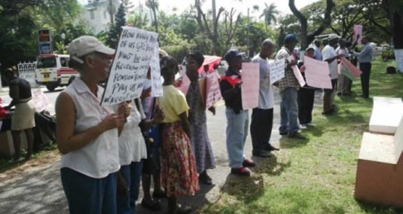 Pensioners picketing the Finance Ministry yesterday