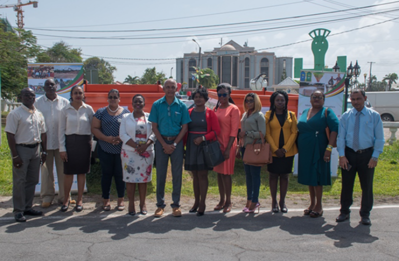 Minister of Communities, Ronald Bulkan (sixth from left); Mayor of Linden, Waneka Arrindell (fifth from left); Lethem Councillor, Ubol McDonald (second from right); Anna Regina, Town Clerk, Diane Critchlow (sixth from right); Head of Sanitation Management Unit, Gordon Gilkes (second from left); and Emil McGarrell, Permanent Secretary, Ministry of Communities with other officials (DPI photo)