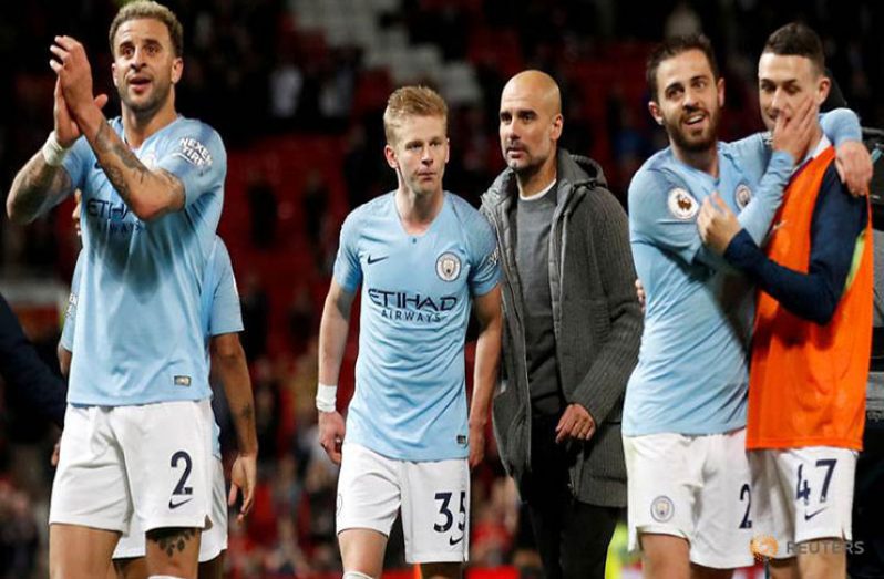 Manchester City manager Pep Guardiola and Oleksandr Zinchenko after the match. (Action Images via Reuters/Carl Recine)