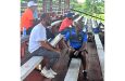 Chief selector Andre  Percival, his fellow selectors and Coach Grimmond (sitting in front) watch yesterday’s practice game at the National Park tarmac (Sean Devers photo).