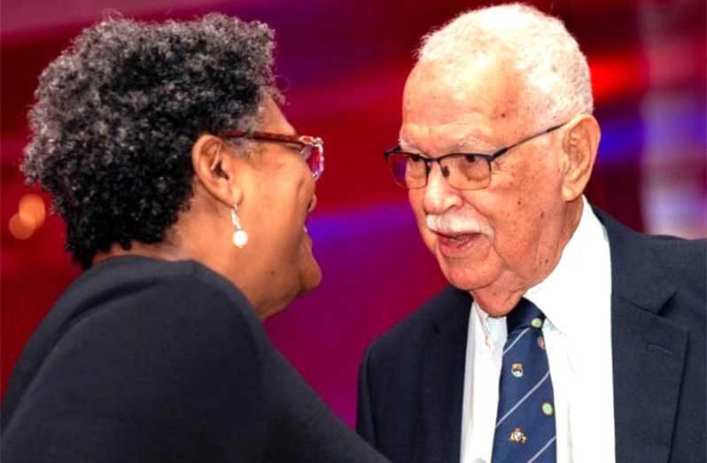 Reds Perreira is greeted by Barbados Prime Minister, The Hon. Mia Mottley