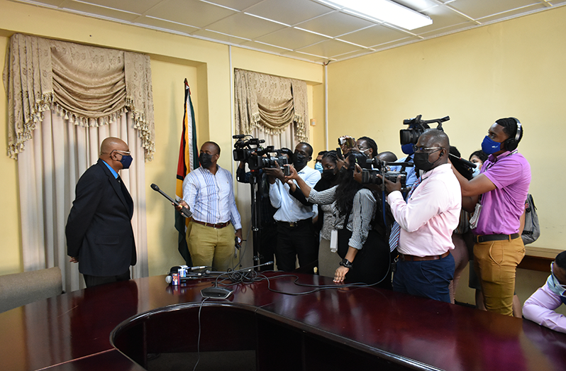 GECOM’s CEO, Vishnu Persaud speaks with members of the media after being sworn in on Friday (Carl Croker photograph)