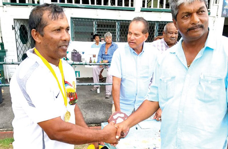 Man-of-the-Match, Basil Persaud, receiving his medal from Krish Nath, UK Coordinator of tour