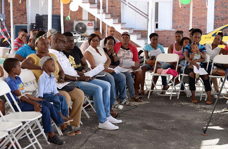 Persons taking part in community discussions in Sophia.