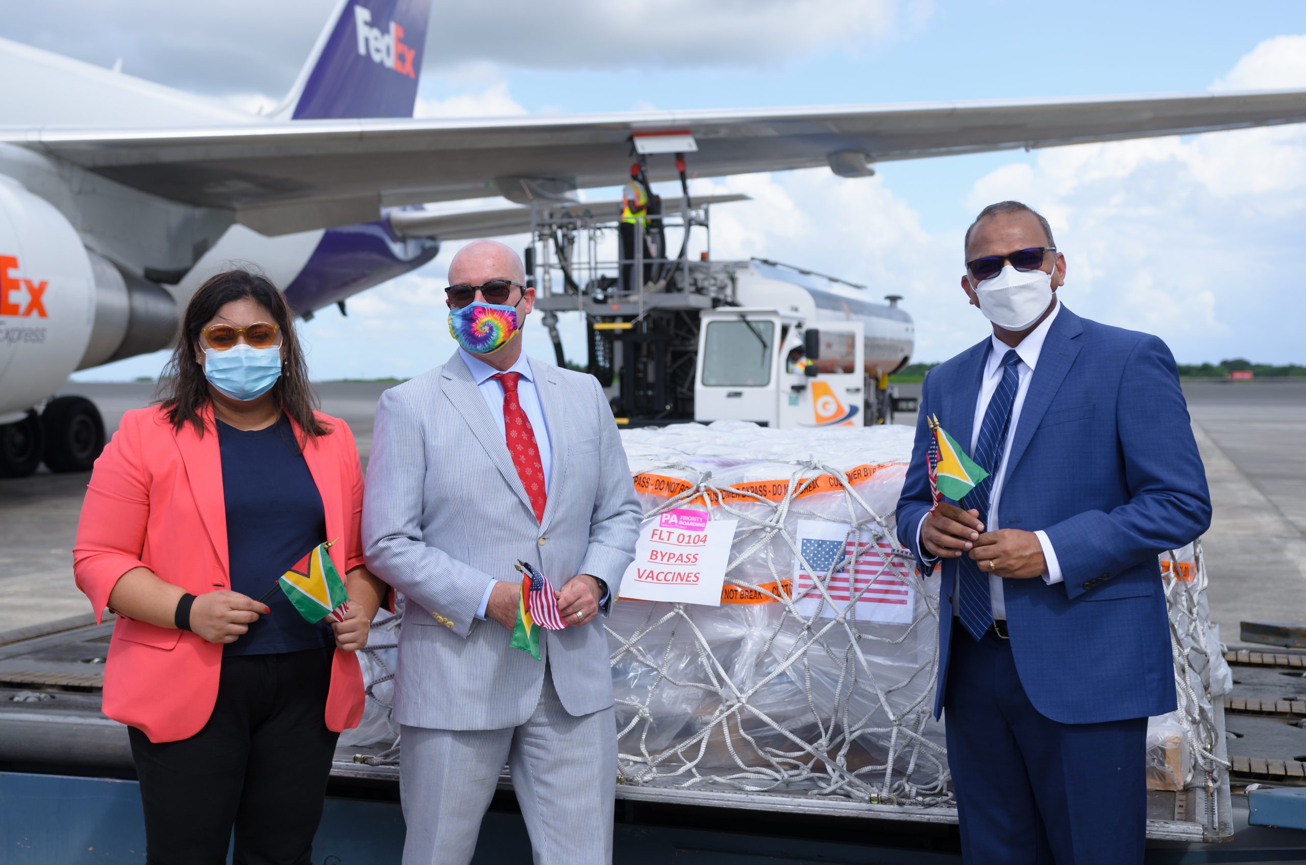(from left): Minister of Education Priya Manickchand; Deputy Chief of Mission at the United States Embassy in Guyana, Mark Cullinane, and Minister of Health, Dr. Frank Anthony, receiving the 146,250 doses of the Pfizer-BioNTech COVID-19 vaccine at the Cheddi Jagan International Airport, on Tuesday (Delano Williams photo)