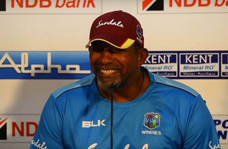 West Indies head coach Phil Simmons shares a light moment with journalists during yesterday’s media conference.