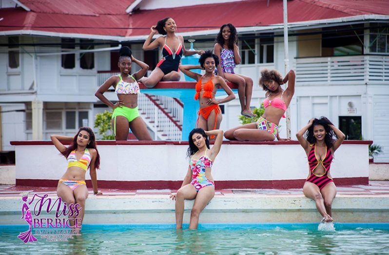 Delegates strike a pose in their swimwear as they gear up for the swimsuit segment, to be held at the Skeldon Estate Poolside.