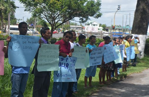Some of the protestors standing in solidarity with the 21 Chenapao residents who were arrested on Sunday