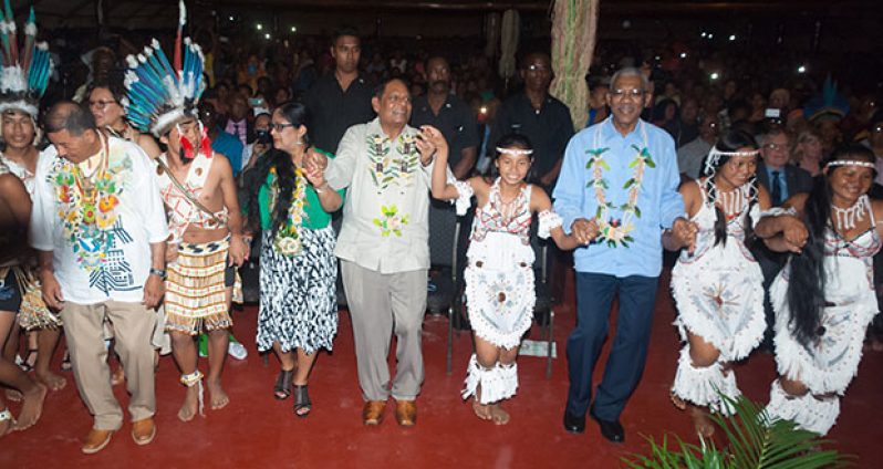 Participating in a traditional dance are: President David Granger, third right; Prime Minister Moses Nagamootoo and his wife, Mrs Sita Nagamootoo, third and fourth right, respectively; and Minister of Indigenous People's Affairs, Sydney Allicock, left (Photos by Delano Williams)