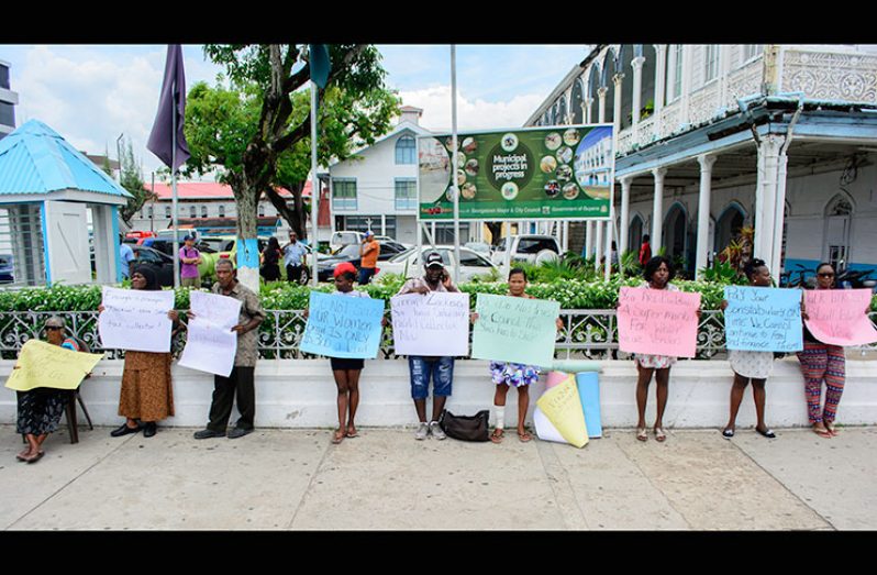 Vendors protesting yesterday in front of City Hall (Photo by Samuel Maughn)
