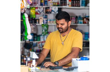 As his father battles illness, 24-year-old Ravindra Singh works to preserve a family legacy while calling for collaborative development in his hometown of Bartica (Japheth Savory photo)