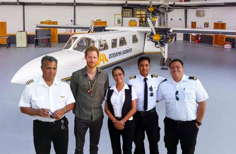 Captain Debbie Gouveia (centre) and her family with Prince Harry (second from left), when he visited Guyana last December