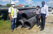 Left to right – Contractor, Suresh Jagmohan; GWI’s CEO, Shaik Baksh & GWI’s Executive Director of Projects, Aubrey Roberts 
