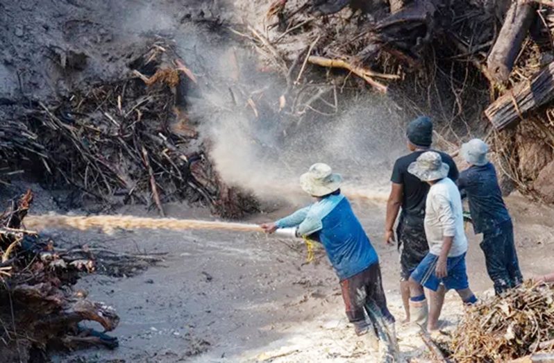 Miners working in a mining pit