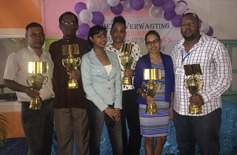 NDC Awards Ceremony. Trophies presented to officials of the Region and Local Govt Department:
             From left:  Mr. Ramnarine Singh, AREO; Mr. Lambert, Regional Vice Chairman; Renisa Singh, NDC Clerk; Michelle Otto, NDC Overseer; Rashmie Chetam, RDO Overseer.