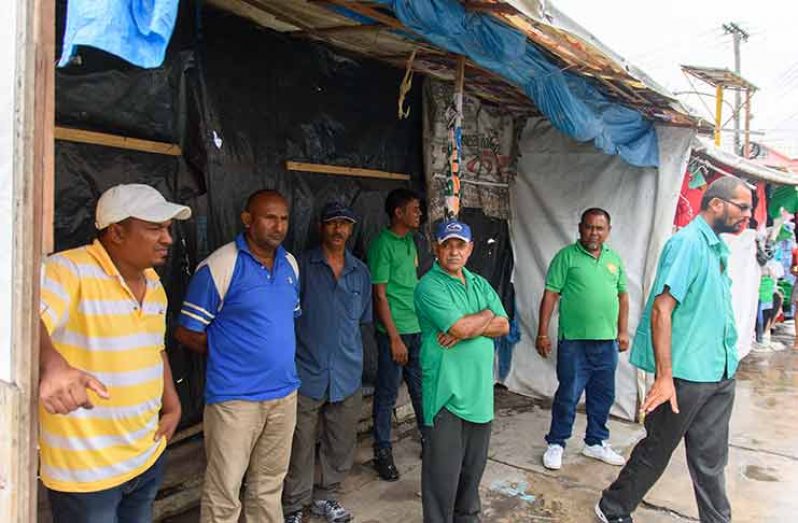 Disgruntled minibus drivers at the Plaisance Bus Park (Samuel Maughn photo)