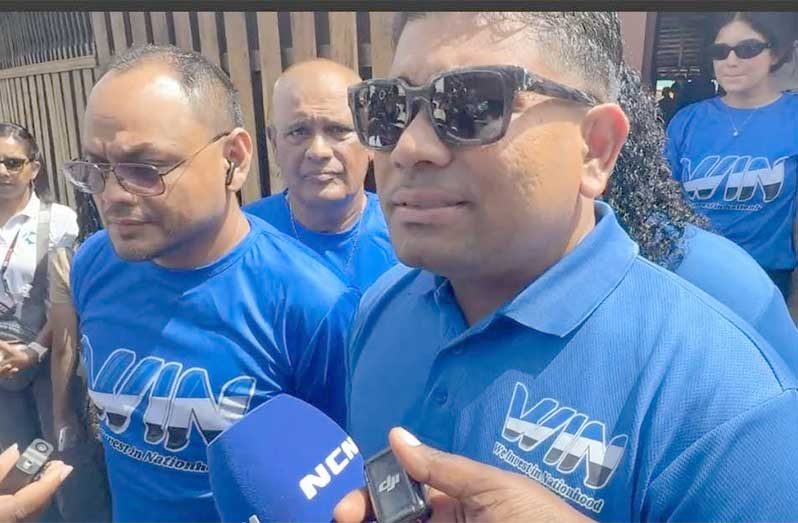US-sanctioned businessman and leader of WIN, Azruddin Mohamed (right) and ANUG Chairman, Dr. Mark France responding to questions at Umana Yana, on Monday