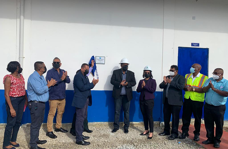 President Dr Irfaan Ali; Minister of Housing and Water, Collin
Croal; Minister within the Ministry of Housing and Water, Susan Rodrigues and other officials at the unveiling of the plaque to officially commission the Sheet Anchor water-treatment plant