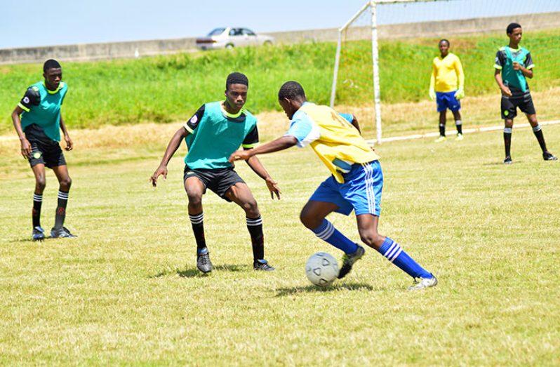 Action on the opening day of the Petra/Milo U-18 football tournament (Cullen-Bess  Nelson photo)