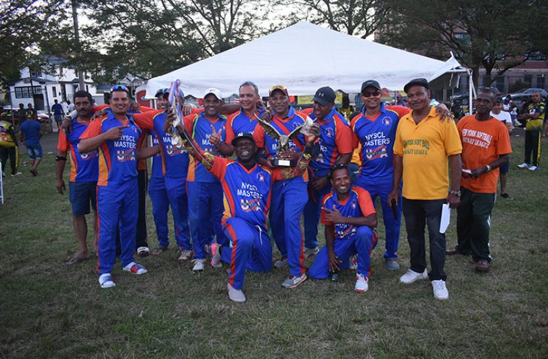 NYSCL players celebrate winning the Legends Cup. President Eric Ferrier is second from extreme right. (Pictures, courtesy of John Ramsingh)