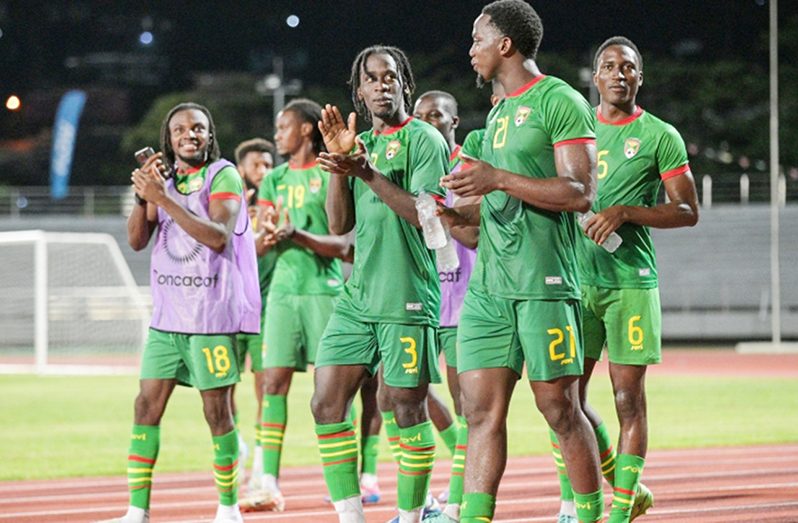 Grenada players celebrate their win