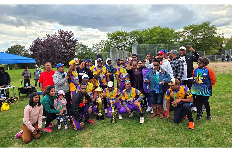 The victorious Better Hope players and supporters pose with their winnings