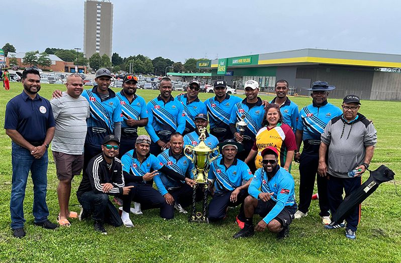 The victorious Mercenary players and OSCL executive members. President Shiv Persaud is at extreme left