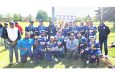 The victorious Malvern All Stars players and supporters. At extreme right is OSCL President, Shiv Persaud, while Vice-president Amit Bacchus is extreme left.