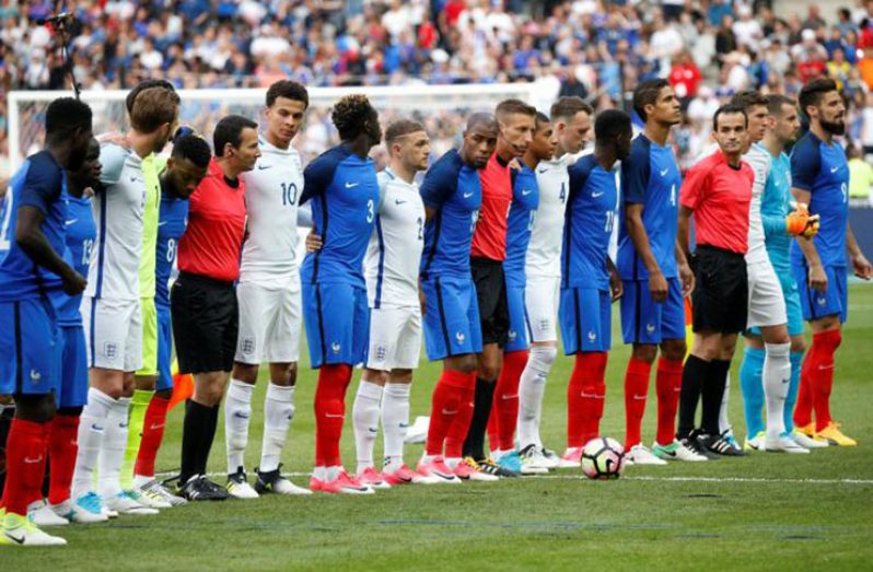 France and England players line up with officials before the match Reuters / Charles Platiau