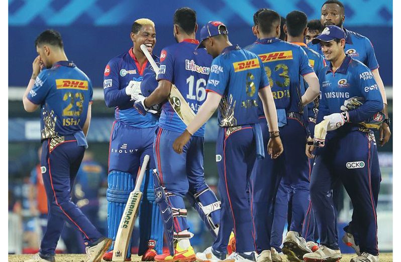 Mumbai Indians and Delhi Capitals players greet one another after the match. (Image Credit: Sportzpics for BCCI)