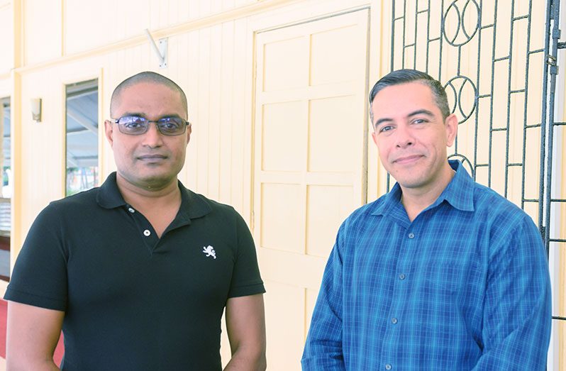Superintendent Shivpersaud Bacchus and leader of the Military Information Support Team of the United States Embassy, David Giraldo