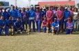 Both the Police team, left, and ACS display their winnings following the presentation ceremony