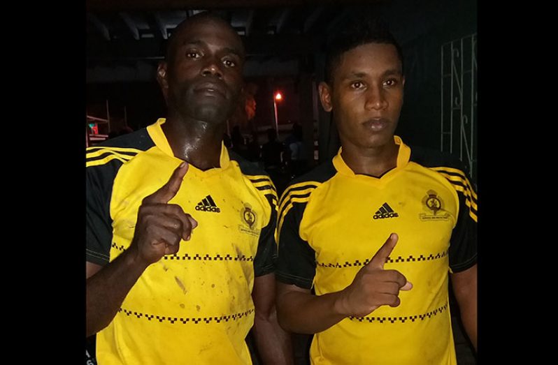 Goalscorers for Police FC at the end of regulation time, Acho Wallace (left) and Rawl Haynes.