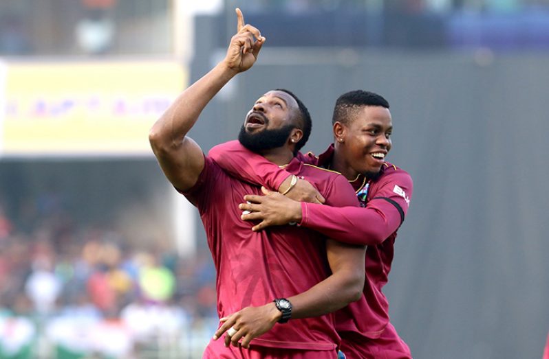 Kieron Pollard and Shimron Hetmyer celebrate Virat Kohli's dismissal, India v West Indies, 2nd ODI, Visakhapatnam, December 18, 2019.