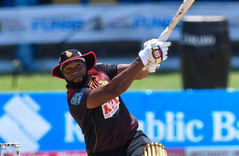 Kieron Pollard clubs one over long-on. (Randy Brooks - CPL T20/Getty)