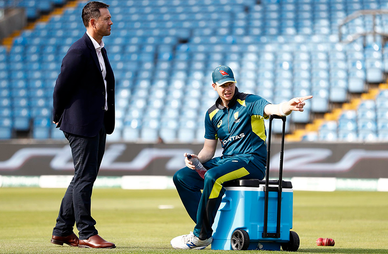 Delhi coach Ricky Ponting (left) is delighted to secure the talent and experience of the Aussie superstar, although the 31-year-old is no certain starter.