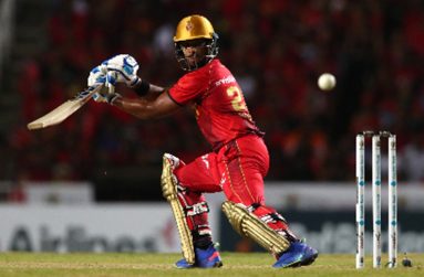 Left-hander Nicholas Pooran gathers runs behind point during his half-century on Saturday night. (Photo courtesy CPLT20/Getty Images)