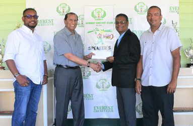 At ECC, Pooran Singh (second from left) makes the donation to club  president Manzoor Nadir, in the presence of former club presidents and current life members Mark Singh (left) and Rajesh Singh (right)