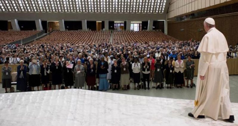 (Pope Francis (R) is greeted by members of the UISG (International Union of Superiors General) during an audience at the Vatican, May 12, 2016. Osservatore Romano)