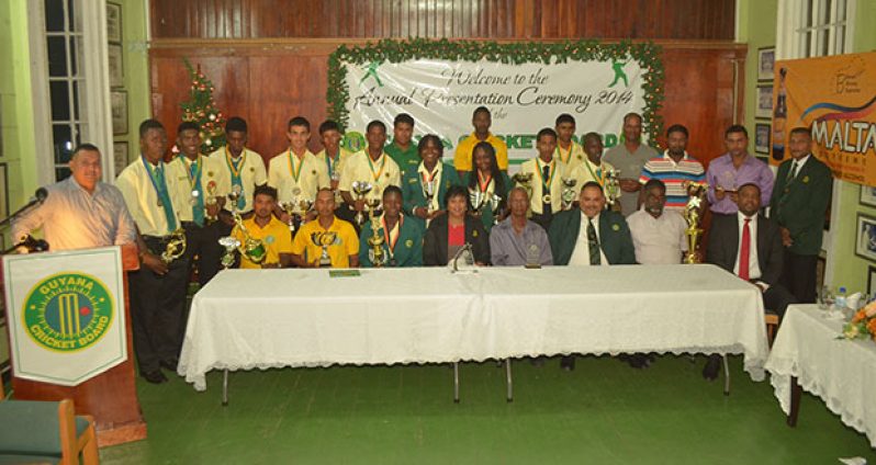 The Awardees or their representatives strike a pose with members of the Guyana Cricket Board and their feature speaker for the night’s activity, WICB president Whycliffe ‘Dave’ Cameron (sitting at right). (Photo by Cullen Bess-Nelson)