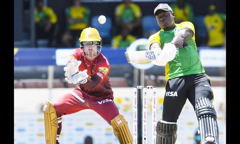 Rovman Powell hits out during his half-century against TKR yesterday (Photo courtesy Getty/CPL)