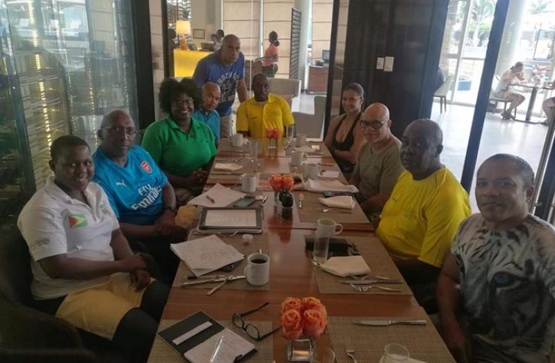 The executive members of the GAPLF with Mr. Dennis Ivor Carrington and Mr. Patrick Barton of the Pele Football Club Alumni Corporation.