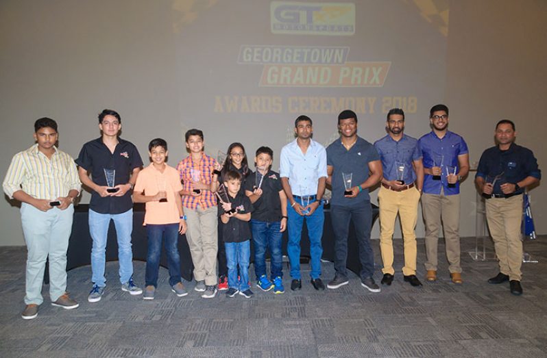 Various winners and honourees stand for a photo following the presentation ceremony at the GT Motorsports facility (Delano Williams Photo)